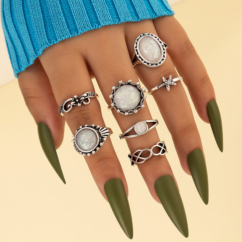 8-piece ring set vintage with turquoise carved feather ring