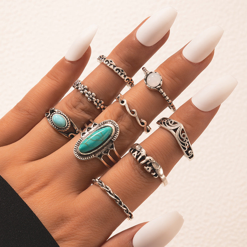 8-piece ring set vintage with turquoise carved feather ring