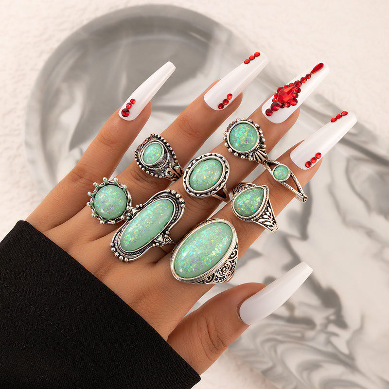 8-piece ring set vintage with turquoise carved feather ring