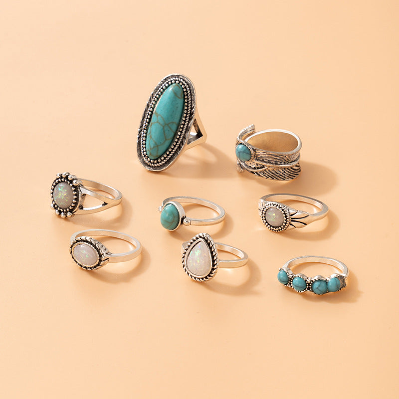 8-piece ring set vintage with turquoise carved feather ring