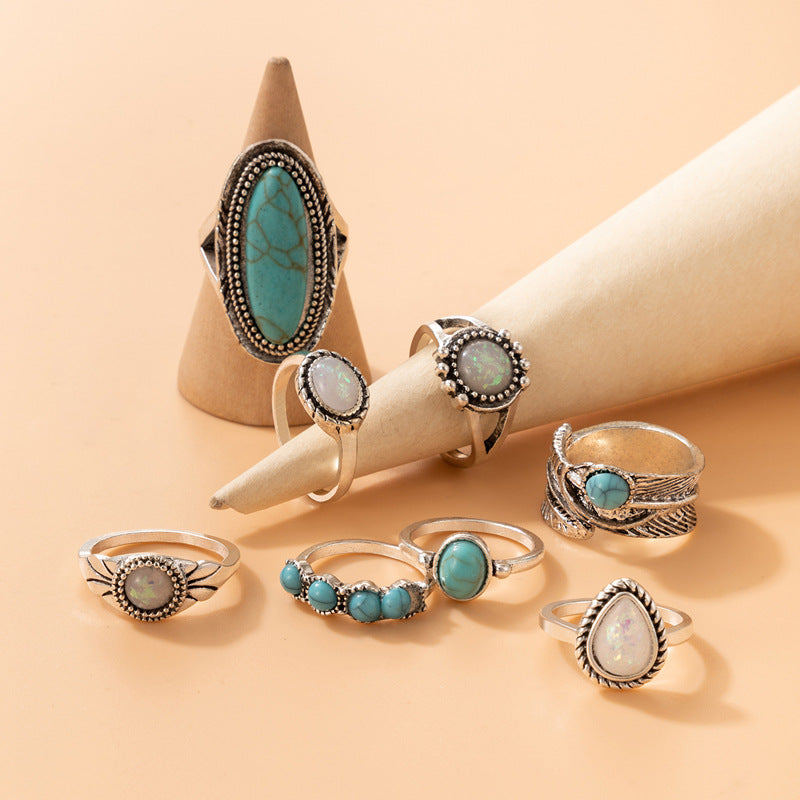 8-piece ring set vintage with turquoise carved feather ring